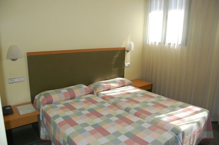 Hotel Lugones Nor Pokoj fotografie